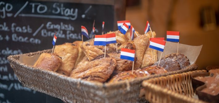 baked pastries on brown wicker basket