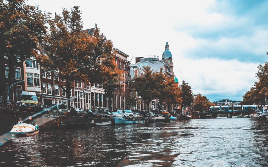 Amsterdam white boats near buildings